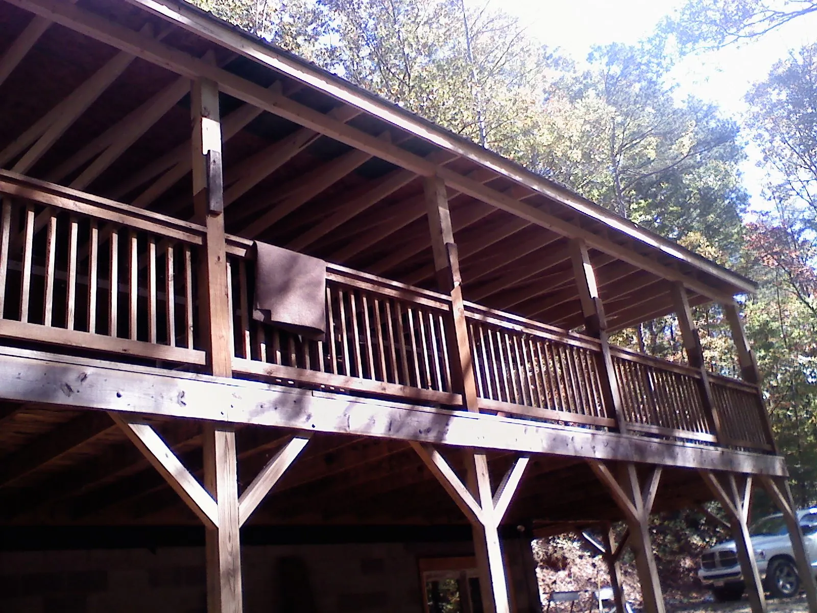 Timber framing under a new elevated porch and deck — Roof Leak Repair in Russell by Roofing Brothers